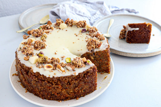 Classic carrot cake with cream cheese frosting and granola crunch - Naturally Granola