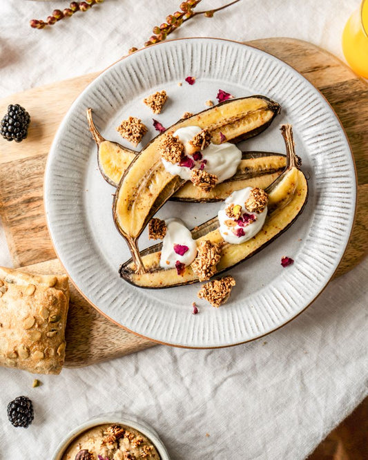 Healthy baked banana split with yoghurt and granola - Naturally Granola