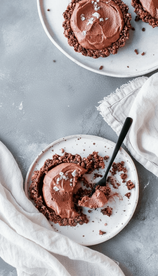 Vegan chocolate mousse tartlets with salted caramel and granola crust - Naturally Granola